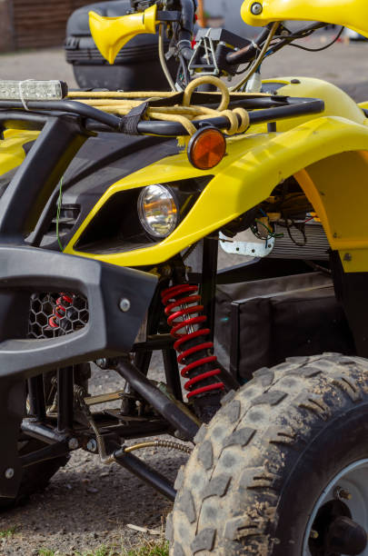 istock Front of  yellow electric ATV. 1280000986