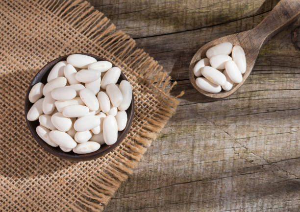 istock Fresh organic natural white bean - Phaseolus vulgaris 1280002641