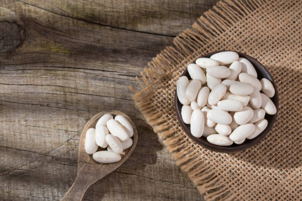 istock Fresh organic natural white bean - Phaseolus vulgaris 1280002725