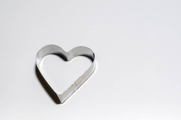 istock Various Christmas-themed cookie cutters. Xmas cookie cutters on white. 1280006659