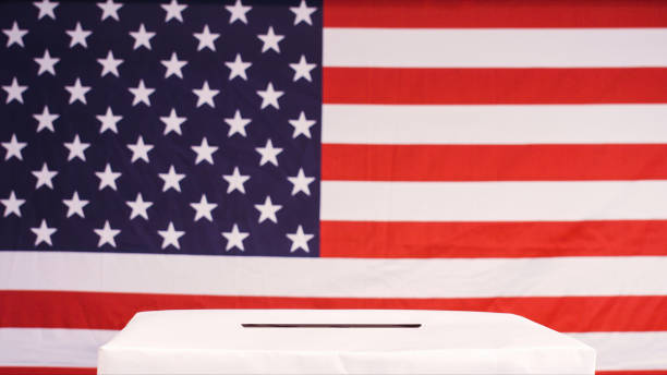 istock White ballot box and american flag 1280006812