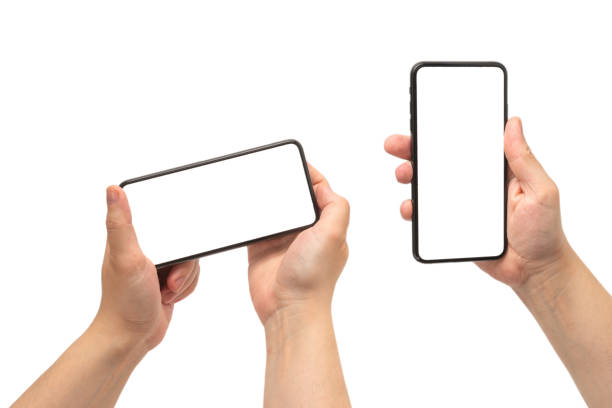 istock Smart phone in man hand isolated on white background.  White screen. 1280006890