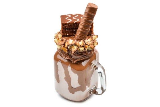 istock Chocolate extreme milkshake with brownie cake, chocolate paste and sweets. Crazy freakshake food trend. Copy space 1280006928