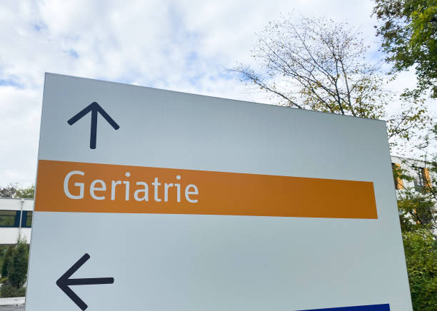 istock View on direction sign at german hospital with word geriatrie 1280008374
