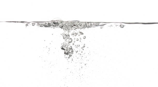 istock Water poured into tank, bubbles and splashes visible on white background 1280008880