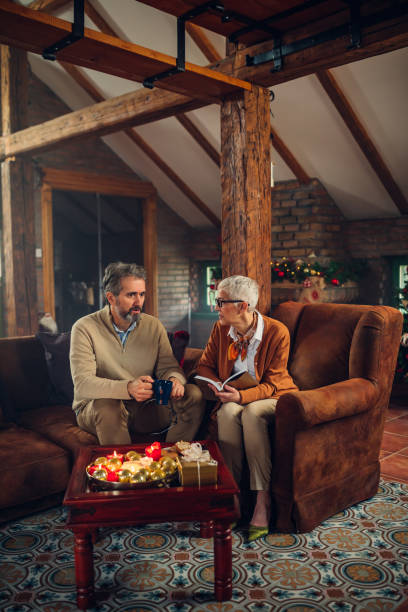 istock Enjoying a book during the Christmas time 1280010091