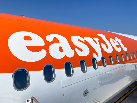 London, United Kingdom - September 23, 2020: EasyJet airlines Airbus A321s at Gatwick LGW airport.  EasyJet, is a British low-cost airline. It operates domestic and international scheduled services on over 1,000 routes in more than 30 countries.