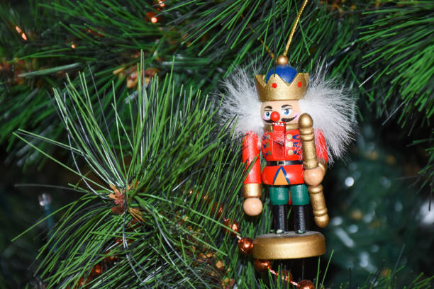 Christmas tree ornament drummer boy on right for holiday winter themes.