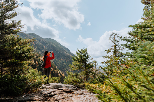 Hiking in the Adirondack Mountain Indian Head Trail in the fall