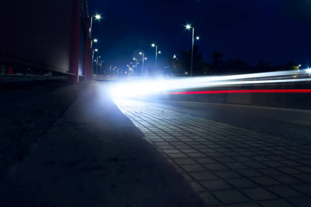 istock Light trails of vehicles 1280016073