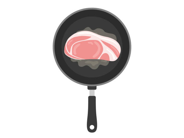 Bake the pork in a frying pan. Bake the pork in a frying pan. pork loin stock illustrations