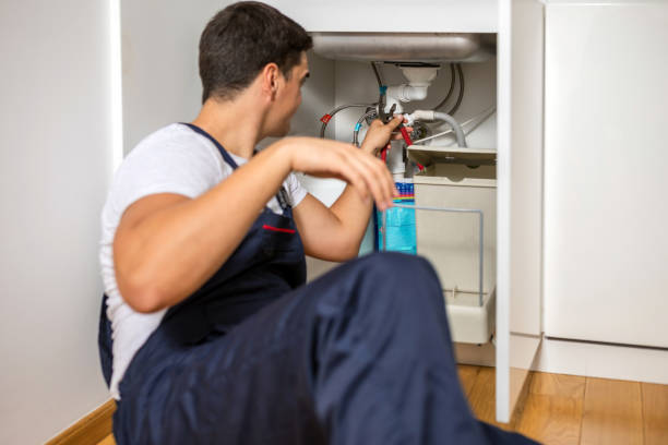 istock Plumber fixing under the sink in the kitchen 1280018385