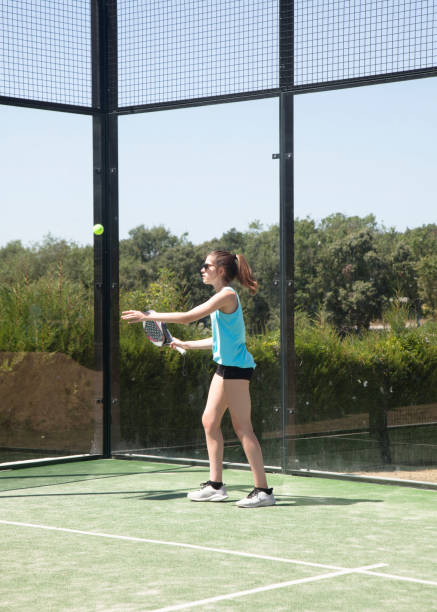 istock Girls playing paddle tennis outdoors training 1280020108