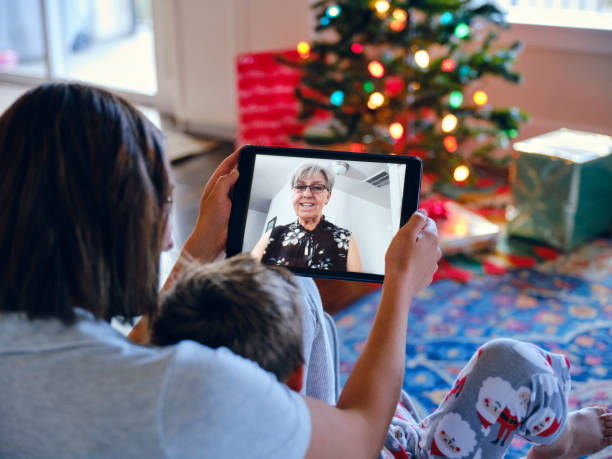 istock Webcam Chat with Grandma on Christmas Morning 1280021391