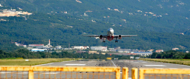 istock Planes on the airport runway are getting ready to take off 1280021584