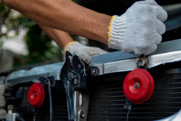 istock Auto mechanic working in garage. Repair service. 1280022948