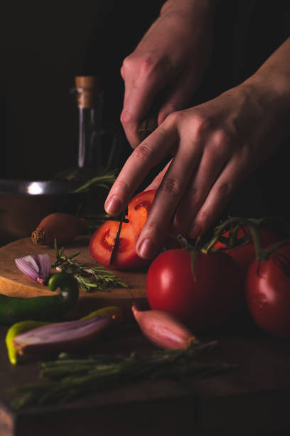 istock Woman preparing vegetable salad in the kitchen 1280023313