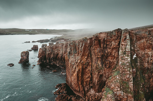 Aerial view of the coastline and cliffs at Braewick on the Atlantic coast of the Shetland Islands.