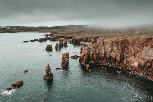 Aerial view of the coastline and cliffs at Braewick on the Atlantic coast of the Shetland Islands.