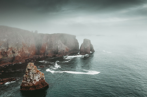 Aerial view of the coastline and cliffs at Braewick on the Atlantic coast of the Shetland Islands.