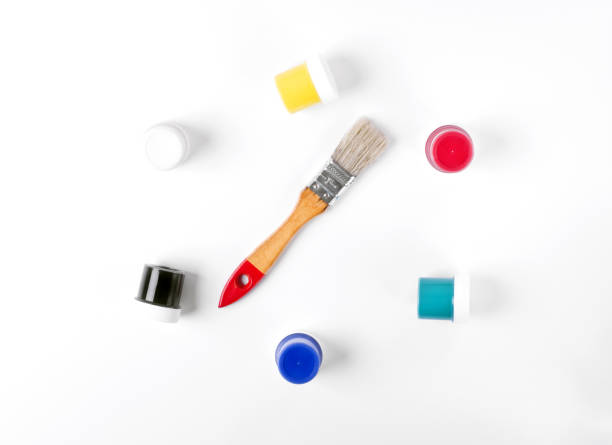 istock Gouache set and brush against the white background 1280025588