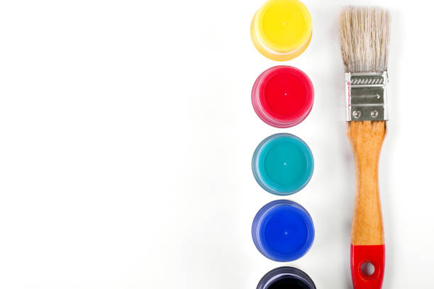 istock Gouache set and brush against the white background 1280025592