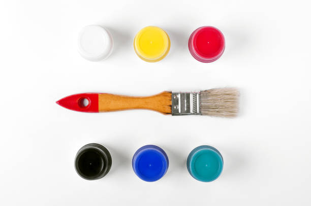 istock Gouache set and brush against the white background 1280025593