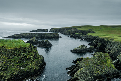 Aerial view of the rocky coastline of St Ninian's Isle, Shetland Islands.