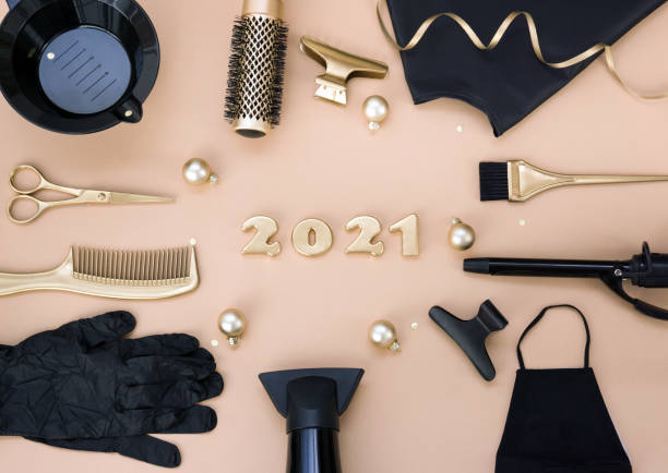 istock New year's banner with hairdressing tools and figures 2021. 1280026949