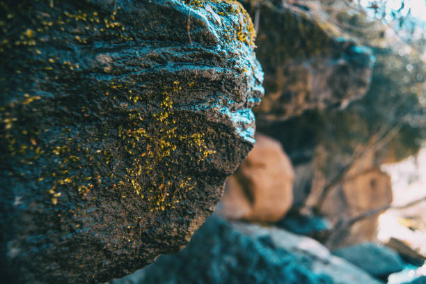 istock A big stone with a bit of moss 1280028816
