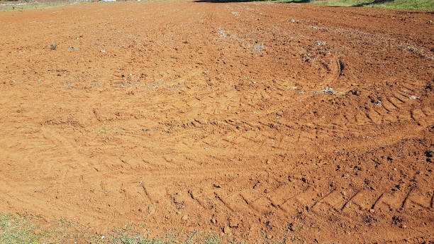 istock field plowed red soil ready for sowing in autumn 1280034155