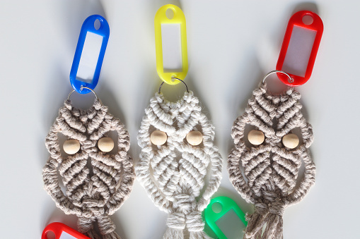 Three unique macrame hand woven owl key rings