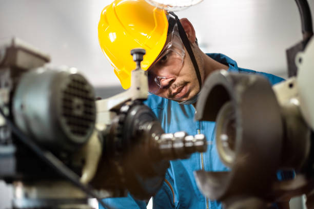 istock experienced operator technician worker or engineer metalworker industrial in safety helmet working or repair on metal machine, professional maintenance skill man in industry manufacturing. men at work 1280035709