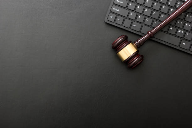 Judge gavel with computer keyboard. Concept of internet crime. Copy space for text Judge gavel with computer keyboard. Concept of internet crime. Copy space for text. gavel keyboard stock pictures, royalty-free photos & images