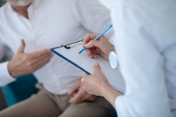 istock Close-up of female doctor hands taking notes 1280036733