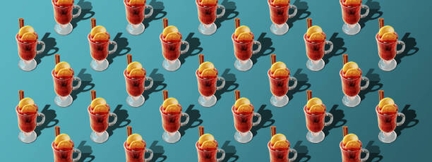 istock Christmas pattern of glasses with mulled wine on blue background. 1280038177
