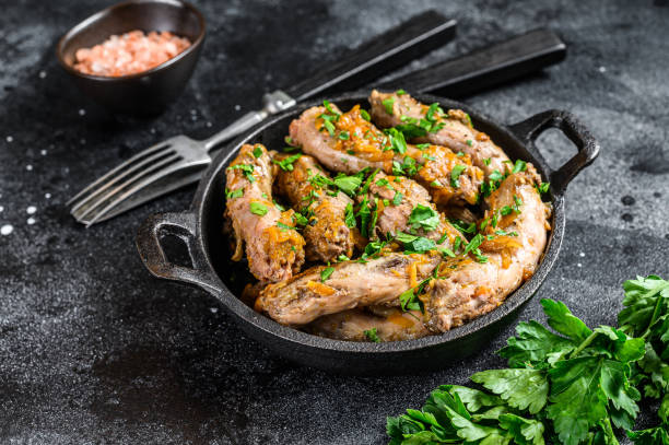 istock Stew with Chicken Neck meat and vegetables. Black background. Top view 1280038942