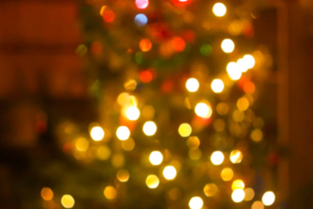 istock Decorated fir tree. Golden blur bokeh light background. 1280039553