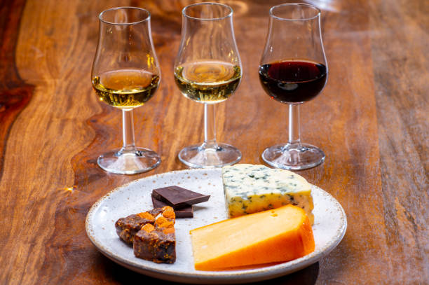 istock Tasting and pairing of different cheeses with strong alcoholic drinks, whisky, cognac or calvados 1280040104