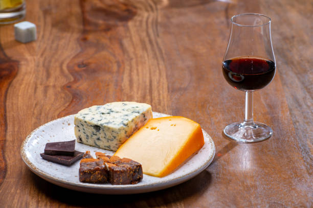 istock Tasting and pairing of different cheeses with strong alcoholic drinks, whisky, cognac or calvados 1280040107