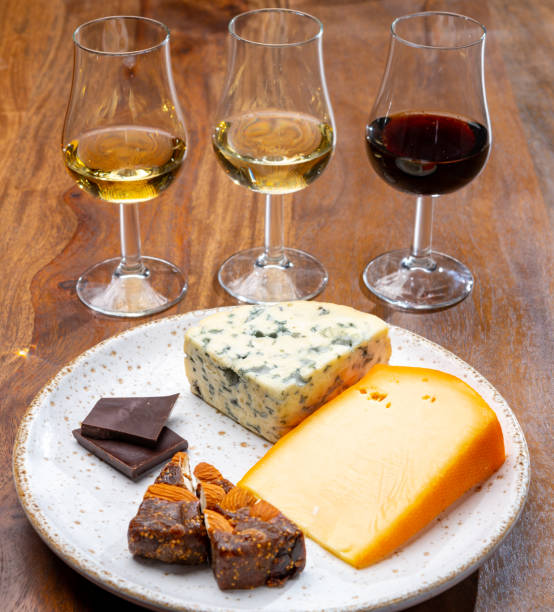 istock Tasting and pairing of different cheeses with strong alcoholic drinks, whisky, cognac or calvados 1280040111