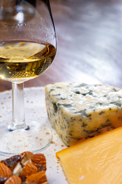 istock Tasting and pairing of different cheeses with strong alcoholic drinks, whisky, cognac or calvados 1280040143