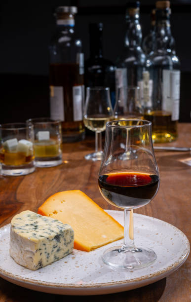 istock Tasting and pairing of different cheeses with strong alcoholic drinks, whisky, cognac or calvados 1280040149