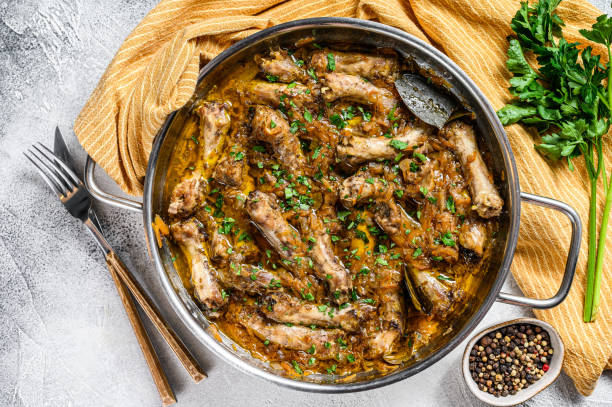 istock Indian Chicken Neck Curry Necks with vegetables. Gray background. Top view 1280040191