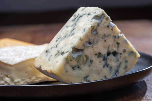 istock Cheese collection, blue cheese, camembert, brie served as dessert with fig almonds bread 1280040200