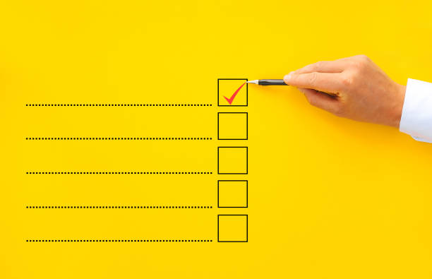 istock Male hand ticking one of all five checkboxes with copy space 1280046309