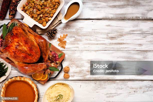 Traditional Thanksgiving Turkey Dinner Top View Side Border On A Rustic White Wood Background Stock Photo - Download Image Now