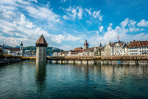 Kapellbrücke Bridge And Buildings On Lake Luzern Quay In Luzern, Switzerland