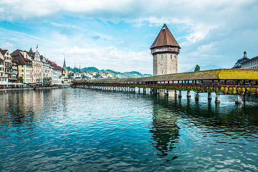Kapellbrücke Bridge And Buildings Near Lake Luzern In Luzern, Switzerland