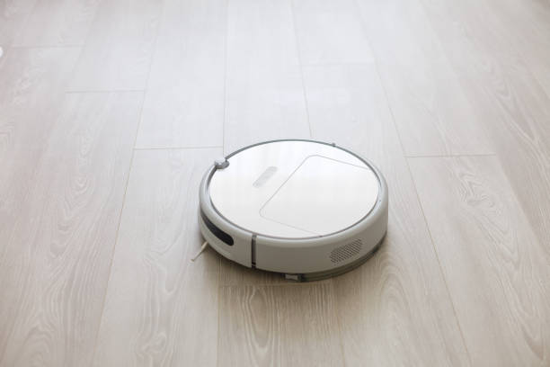 istock robotic vacuum cleaner on laminate wood floor smart cleaning technology 1280054709